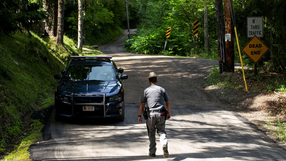 A police officer on a dead-end street