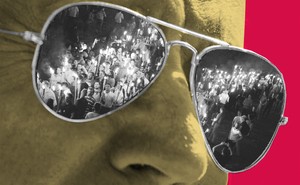 Art of Joe Biden wearing sunglasses, with photos of Charlottesville marchers reflected in the shades