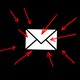 An illustration on a black background of an envelope icon surrounded by many red arrows pointing into it