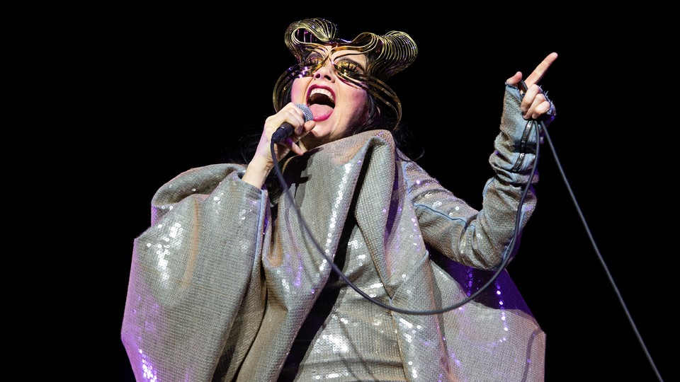 Björk performing in a shimmery costume