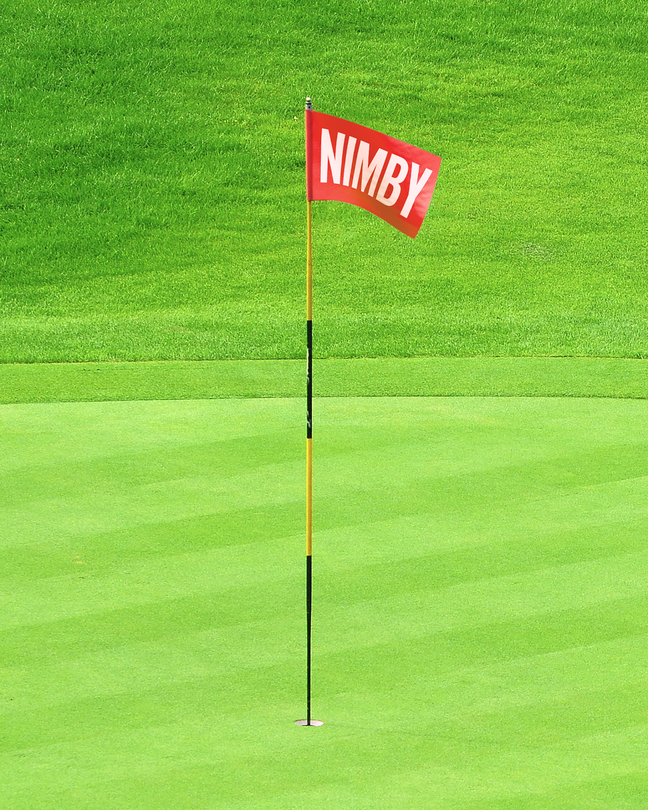 A illustration of a golf flag with "NIMBY" printed on it