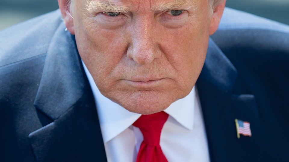 US President Donald Trump speaks to the media after arriving on the South Lawn of the White House in Washington, DC, July 30, 2019, following a trip to the 400th anniversary of Jamestown, Virginia.
