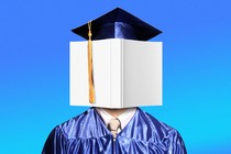 A graduate in cap and gown with a book covering their face