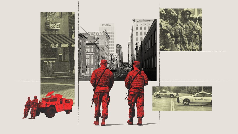 National Guard soldiers and Memphis buildings