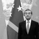 China's Foreign Minister Wang Yi stands alongside Solomon Islands' Foreign Minister Jeremiah Manele