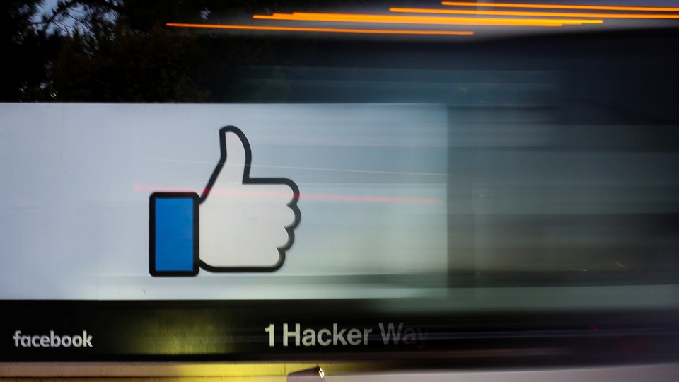 A "like" sign outside the Facebook headquarters in Menlo Park, CA.