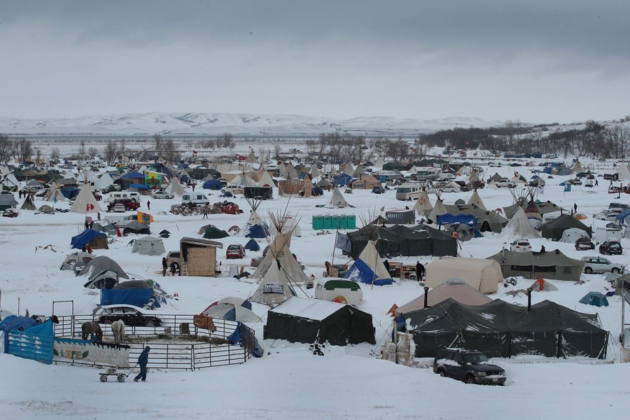 Snow covers Oceti Sakowin Camp near the Standing Rock Sioux reservation on November 30, 2016 outside Cannon Ball, North Dakota.