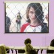 A frame from the documentary "Bad Kids" fills the screen of a projector in a classroom.