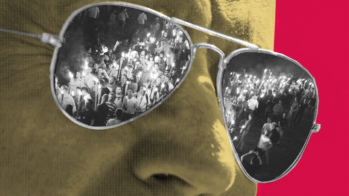 Art of Joe Biden wearing sunglasses, with photos of Charlottesville marchers reflected in the shades