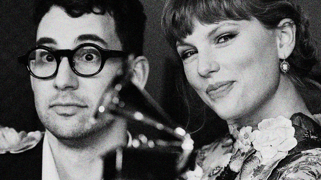 Jack Antonoff and Taylor Swift with a Grammy Award