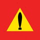 Triangular yellow road sign, but the exclamation mark looks like a launching missile