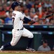 The Houston Astros second baseman Jose Altuve hits a solo home run during the fifth inning against the Boston Red Sox in game one of the 2017 ALDS playoff baseball series at Minute Maid Park.