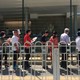 People waiting in line outside the U.S. embassy in Beijing, China on July 26, 2018