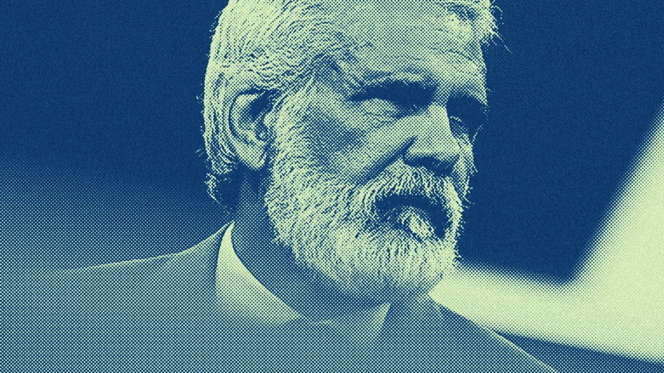 blue-toned photograph of Robert Malone