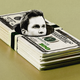 Tom Brady's head poking out of a hole in a stack of $100 bills