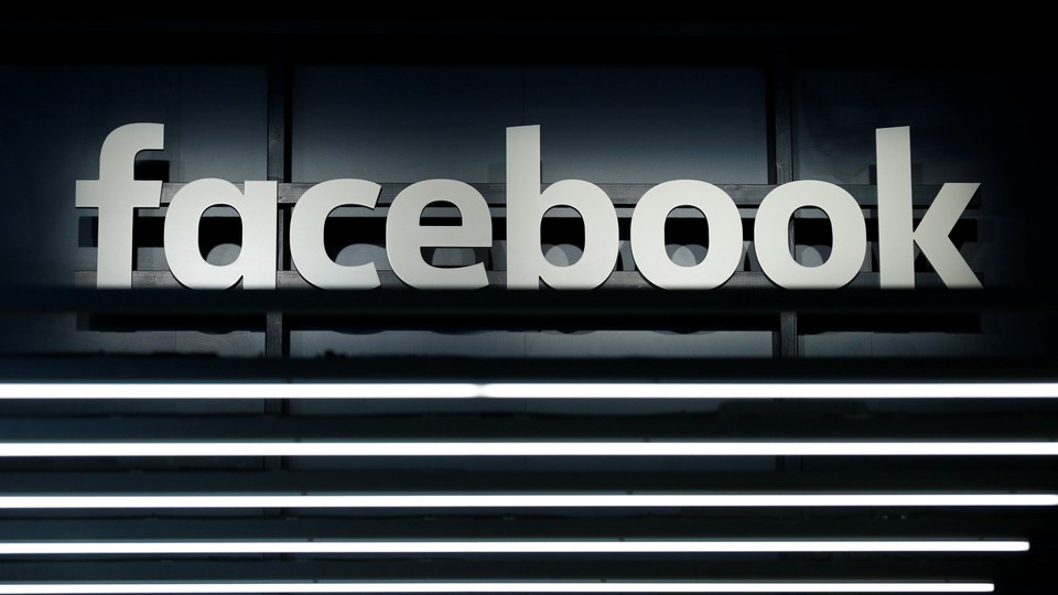 A black-and-white Facebook logo