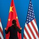 A photo of U.S. and Chinese flags staged for a diplomatic meeting