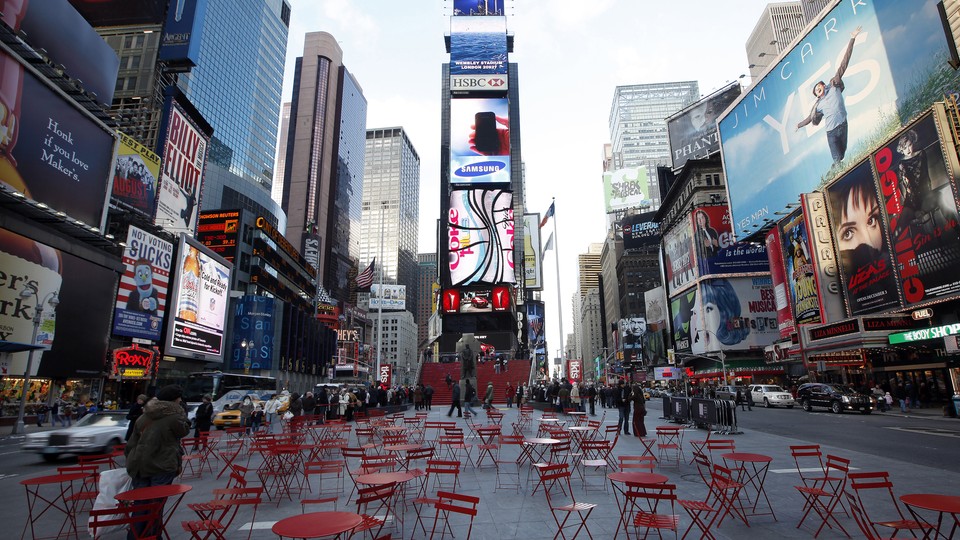 Empty red chairs in the middle of New York's Times Square