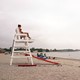 A female lifeguard overlooks the ocean