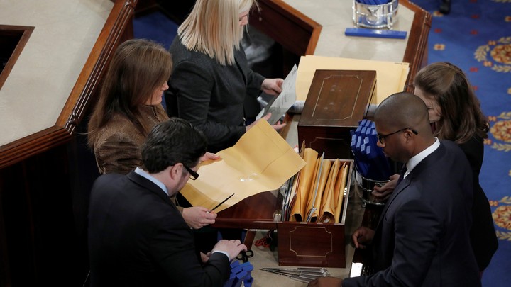 Congressional staffers count the ballots of the Electoral College