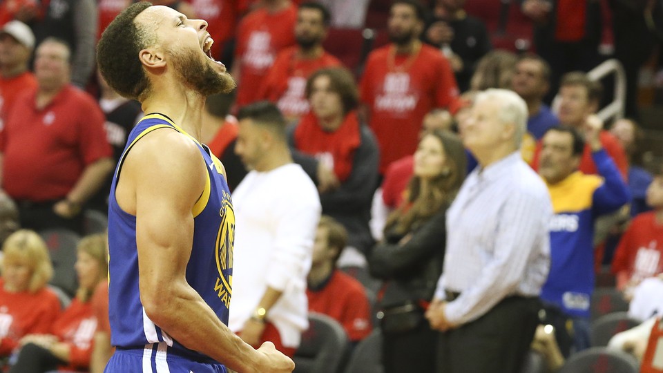The Golden State Warriors guard Stephen Curry reacts after defeating the Houston Rockets on Friday.
