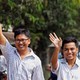 Reuters reporters Wa Lone and Kyaw Soe Oo walk to Insein prison gate after being freed.