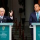 British Prime Minister Boris Johnson and his Irish counterpart, Leo Varadkar, stand behind lecterns to address the press.