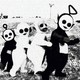 An image of the four Teletubbies (from left to right: Po, Laa-Laa, Dipsy, and Tinky Winky). The photo is rendered in grainy black-and-white, and where the Teletubbies' eyes should be, instead there are black circles.