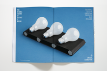Photo of print magazine open to spread "The Eureka Theory of History Is Wrong"