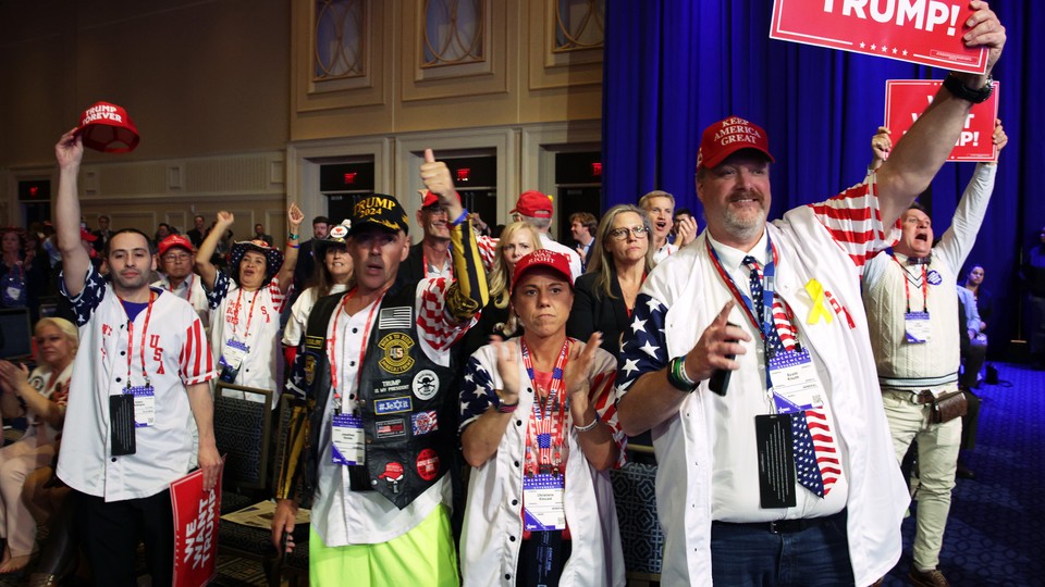 Supporters celebrate as they listen to Donald Trump's address to the annual Conservative Political Action Conference.