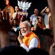India’s Prime Minister Narendra Modi shows his ink-marked finger after casting his vote.