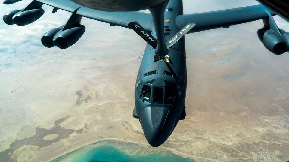 A U.S. Air Force B-52H Stratofortress from Minot Air Force Base, N.D., is refueled by a KC-135 Stratotanker in the U.S. Central Command area of responsibility Dec. 30, 2020.