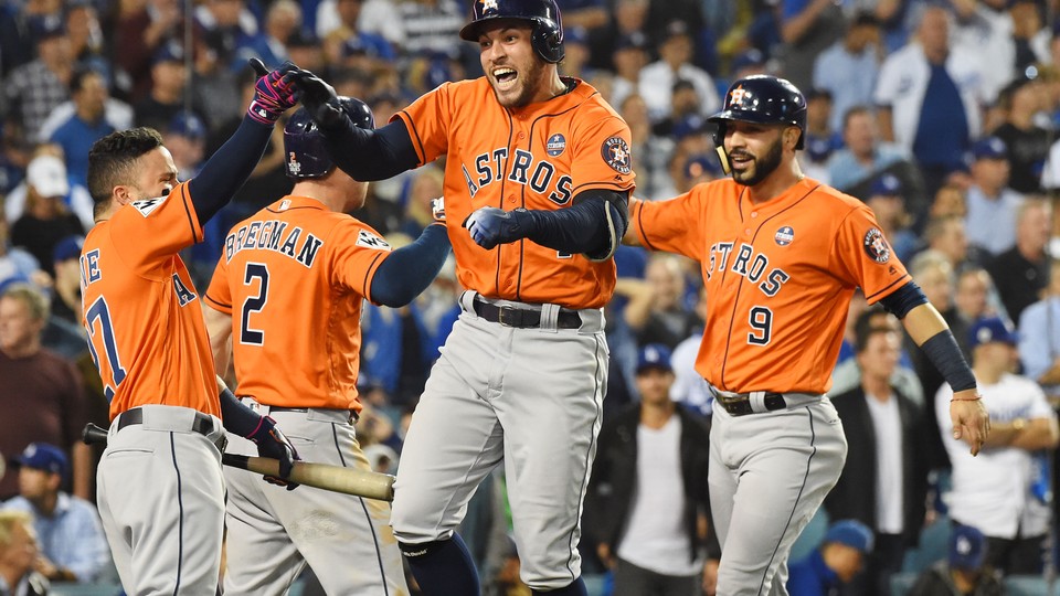 Houston Astros players celebrate after a two-run home run against the Los Angeles Dodgers in the second inning in game seven of the 2017 World Series at Dodger Stadium.