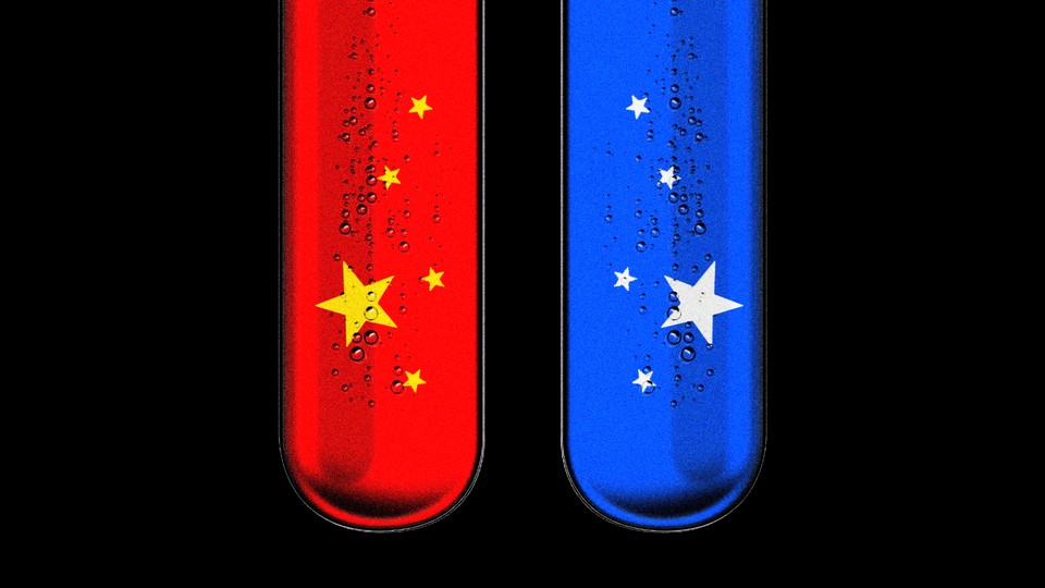 Illustration of two test tubes, one red with gold stars, the other blue with white stars.