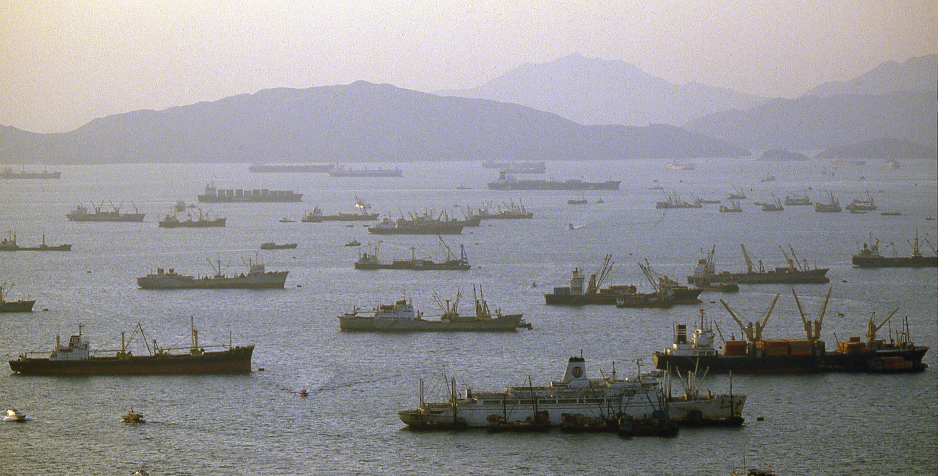 An aerial view of cargo ships in Hong Kong harbor.