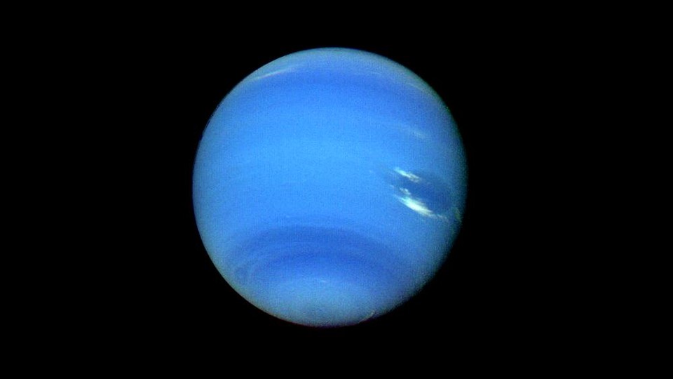 A blue Neptune with white clouds