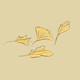 Several yellow fall leaves on tan background