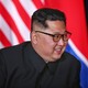 Kim Jong Un smiling