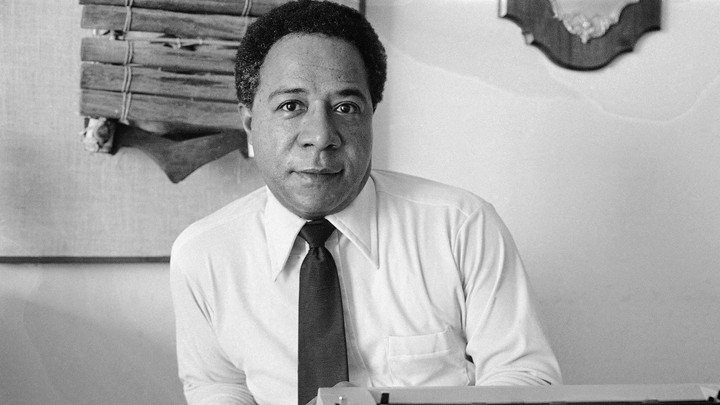 Alex Haley is the author of "Roots," in which a character exclaims "Freedom am won!"