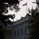 The U.S. flag flies at full-staff over the White House on Monday.