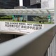 A protester walks past a banner that reads, "This is Hong Kong, not China."
