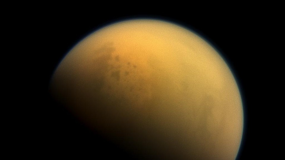 Lakes peek out through the Titan haze.