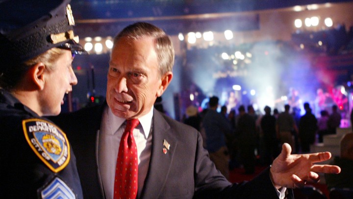 Michael Bloomberg speaking with New York City police sargeant Diane Harwisher at the Republican National Convention in 2004.