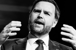 A black and white photo of JD Vance holding his hands out in front of him a foot or so apart