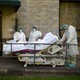 Health-care workers transfer a patient out of the COVID-19 Unit at United Memorial Medical Center in Houston, Texas, during a summer explosion of coronavirus cases.