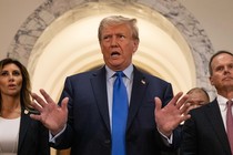 Former U.S. President Donald Trump, center, speaks to members of the media at the New York State Supreme Court on Monday, October 2, 2023.