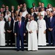 Trump poses with Saudi Crown Prince Mohammed bin Salman and business leaders in Riyadh on May 13.