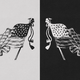 A black-and-white depiction of two American flags, with one in reversed tones