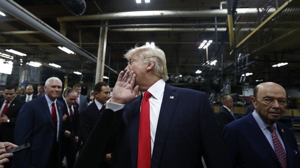 President Trump with two members of his Cabinet