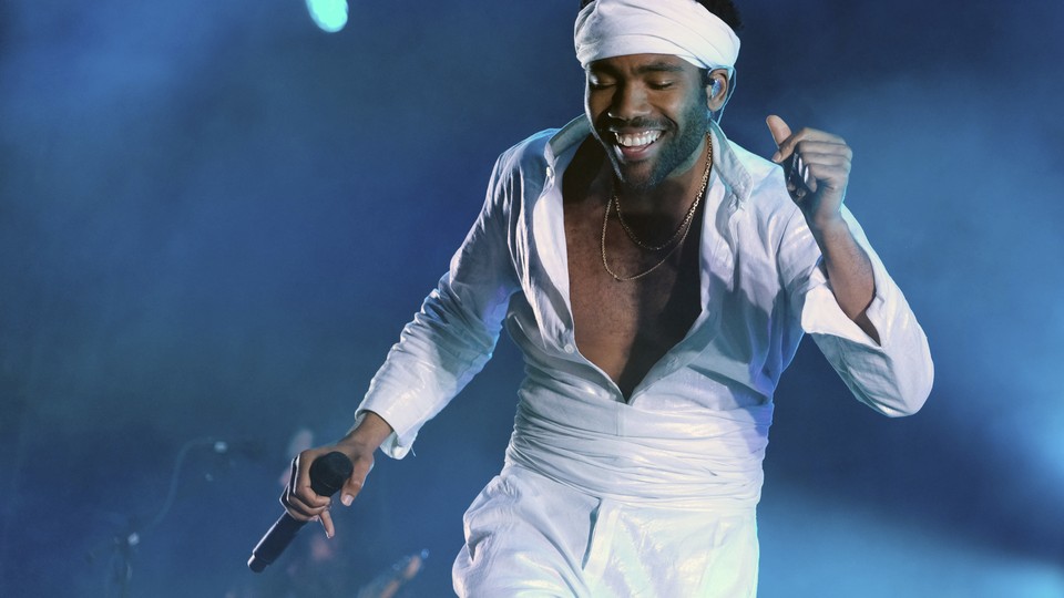 Donald Glover performing at a music festival